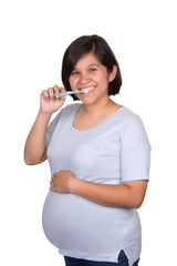 Expectant mom toothbrush close-up showing ultra-soft bristles