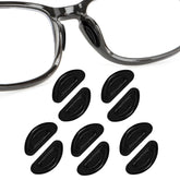 Ten black silicone eyeglasses nose pads at 1mm thickness