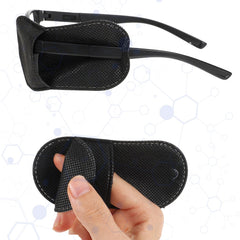 Eye patches attached to glasses showing fit