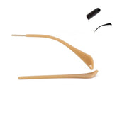 Golden eyeglass end tip close-up