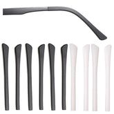 Three black anti-slip silicone eyeglass end tips on display