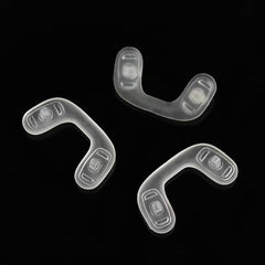 Nose pads mounted on eyeglasses frame