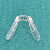 Close-up of silicone saddle bridge nose pad for eyeglasses