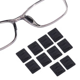 Adhesive-backed silicone eyeglass nose pad — front view