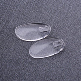 Plug-in eyeglass nose pads in clear silicone