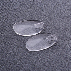 Plug-in eyeglass nose pads in clear silicone