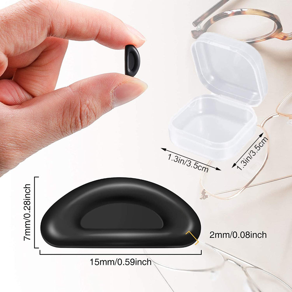 Black silicone half-moon nose pads on frame