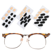 Black D-shaped eyeglass nose pads