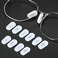 White small silicone eyeglass nose pad covers - 18 pairs