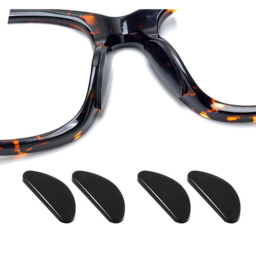Close-up of 20 pairs silicone eyeglasses nose pads (black and clear) 19x8mm