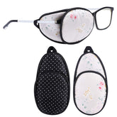 eZAKKA floral and black polka dots eye patch worn over glasses, front view