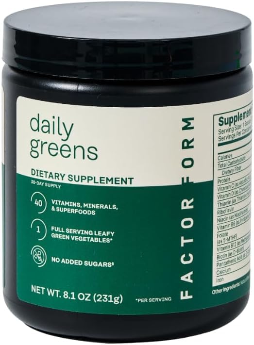 Factor Form Daily Greens powder jar and scoop on a clean surface
