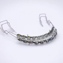 Two-color braces power chains on a teeth model