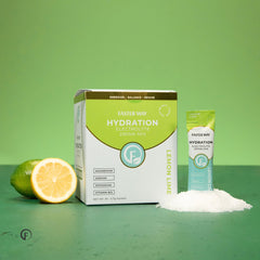 Person preparing Faster Way hydration drink from a 30-pack packet
