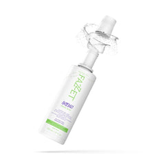 Fresh mint leaves beside FAZZET Intenso Fluoride Oral Rinse