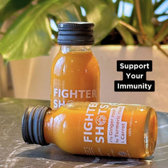 Fighter Shots 12-pack packaging and glass bottle on white