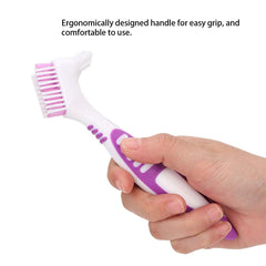 Compact, lightweight denture brush ready for travel