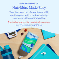 FIRST DAY teen multivitamin gummies on desk ready for a simple morning routine