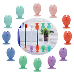 Fish-shaped silicone toothbrush holder with colorful caps