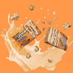 Fit Crunch Delights Cinnamon Roll bar unwrapped; ready-to-eat protein snack.