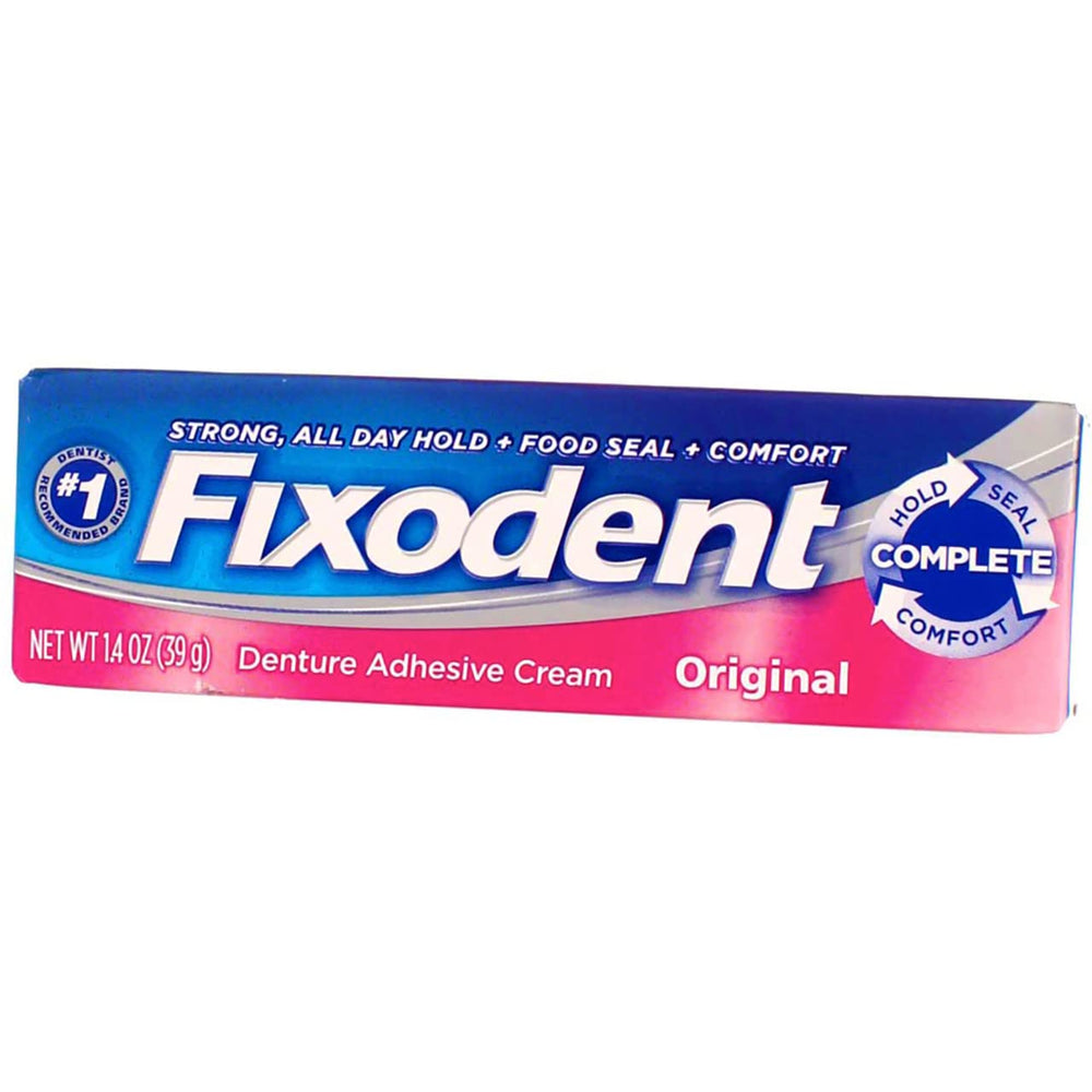 Close-up of Fixodent Original denture adhesive tube with precision tip