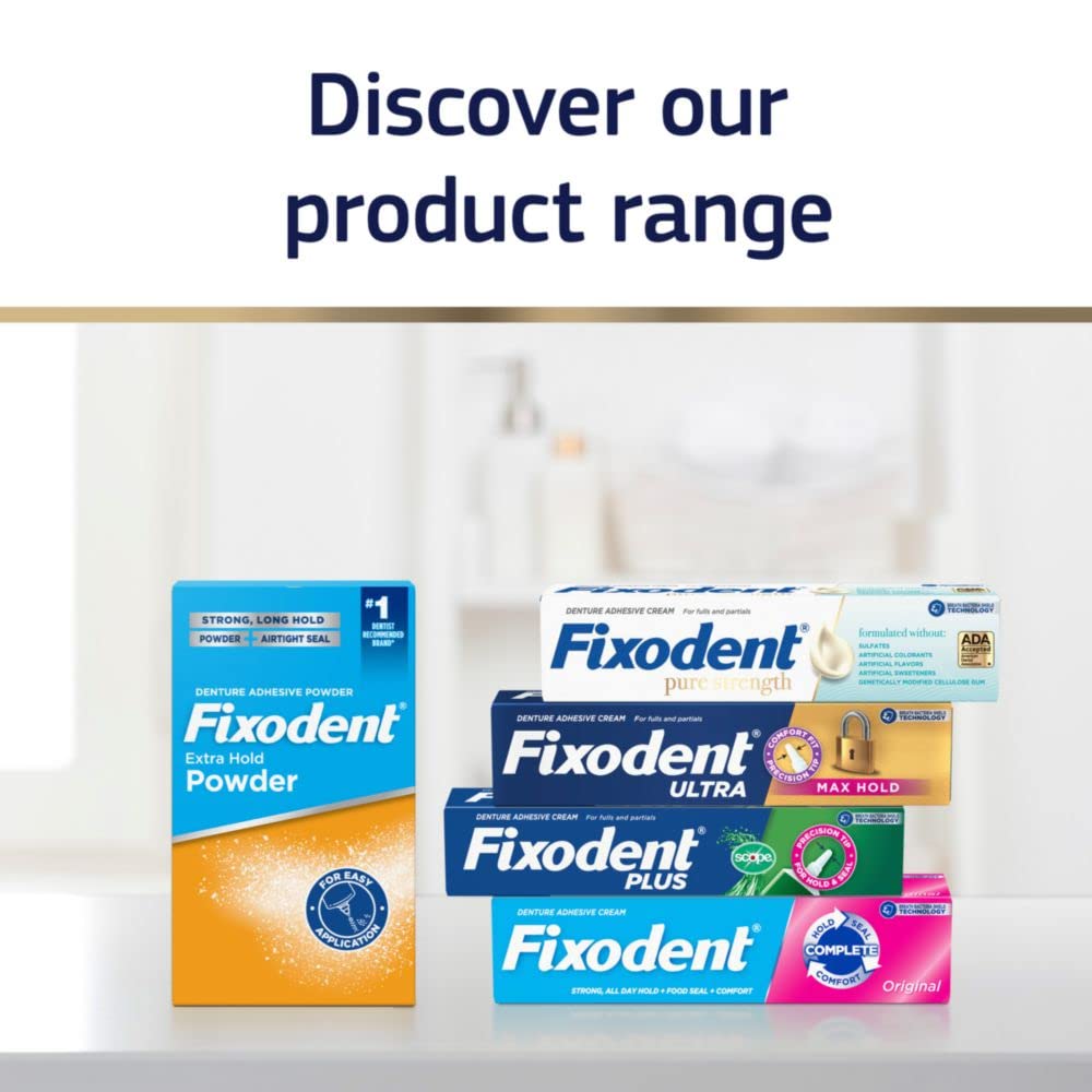 Smiling full denture wearer using Fixodent Pure Strength.