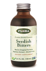 Front view of Flora Swedish Bitters bottle with label
