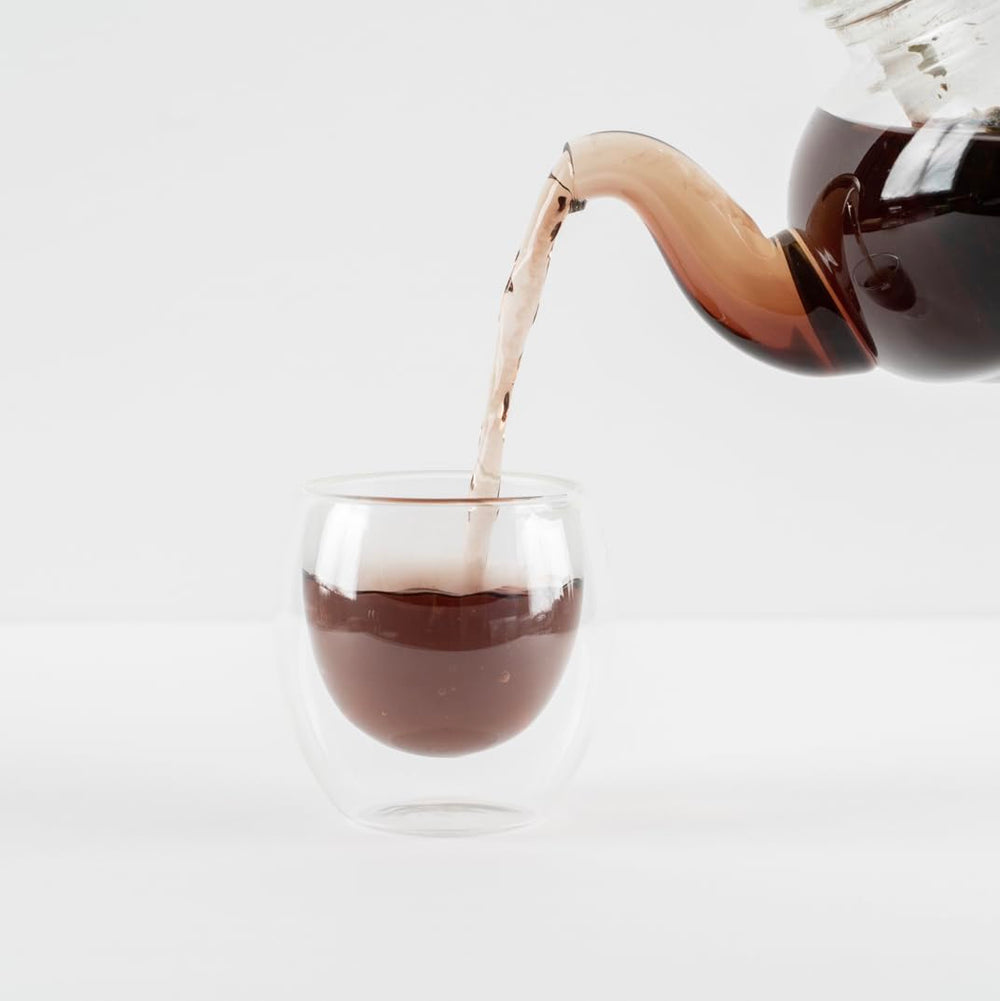 Cup of brewed Food Over Drugs Whole Body Detox Tea