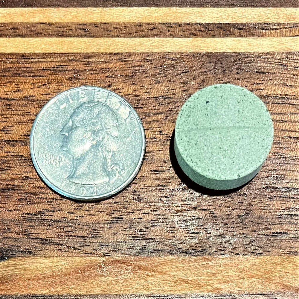 Dog enjoying a Fresh Breath TABS tablet