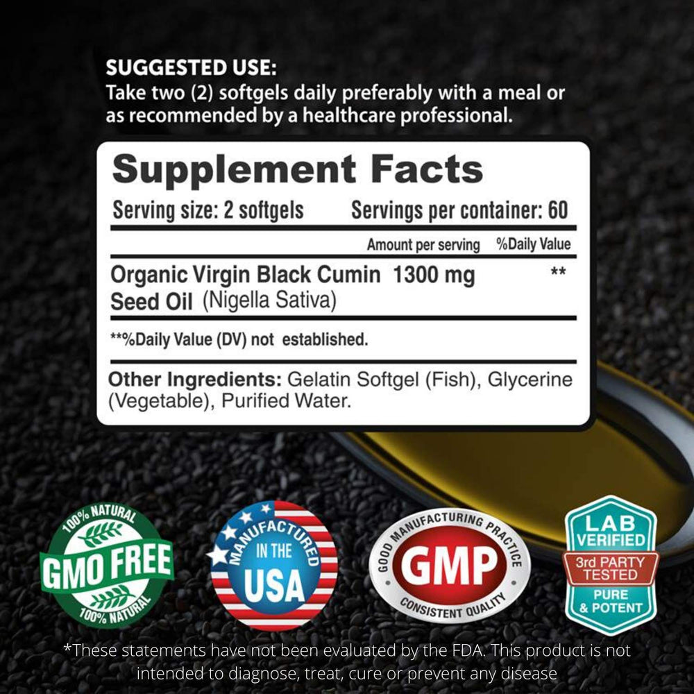 Close-up of black seed oil softgel capsules