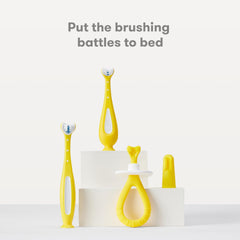 Two brushes included in the Grow-with-Me set for infants and toddlers in yellow