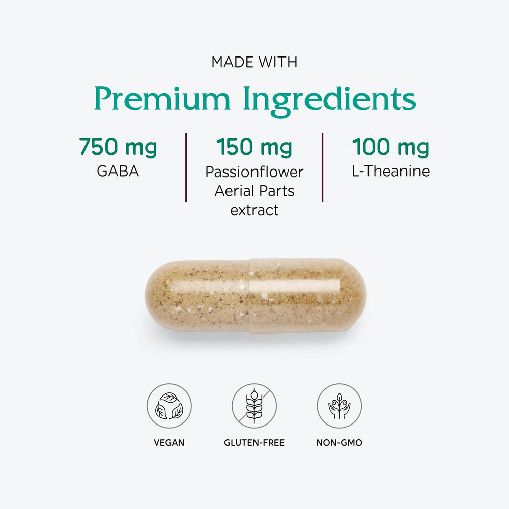 Two vegan capsules of GABA Ease on white background