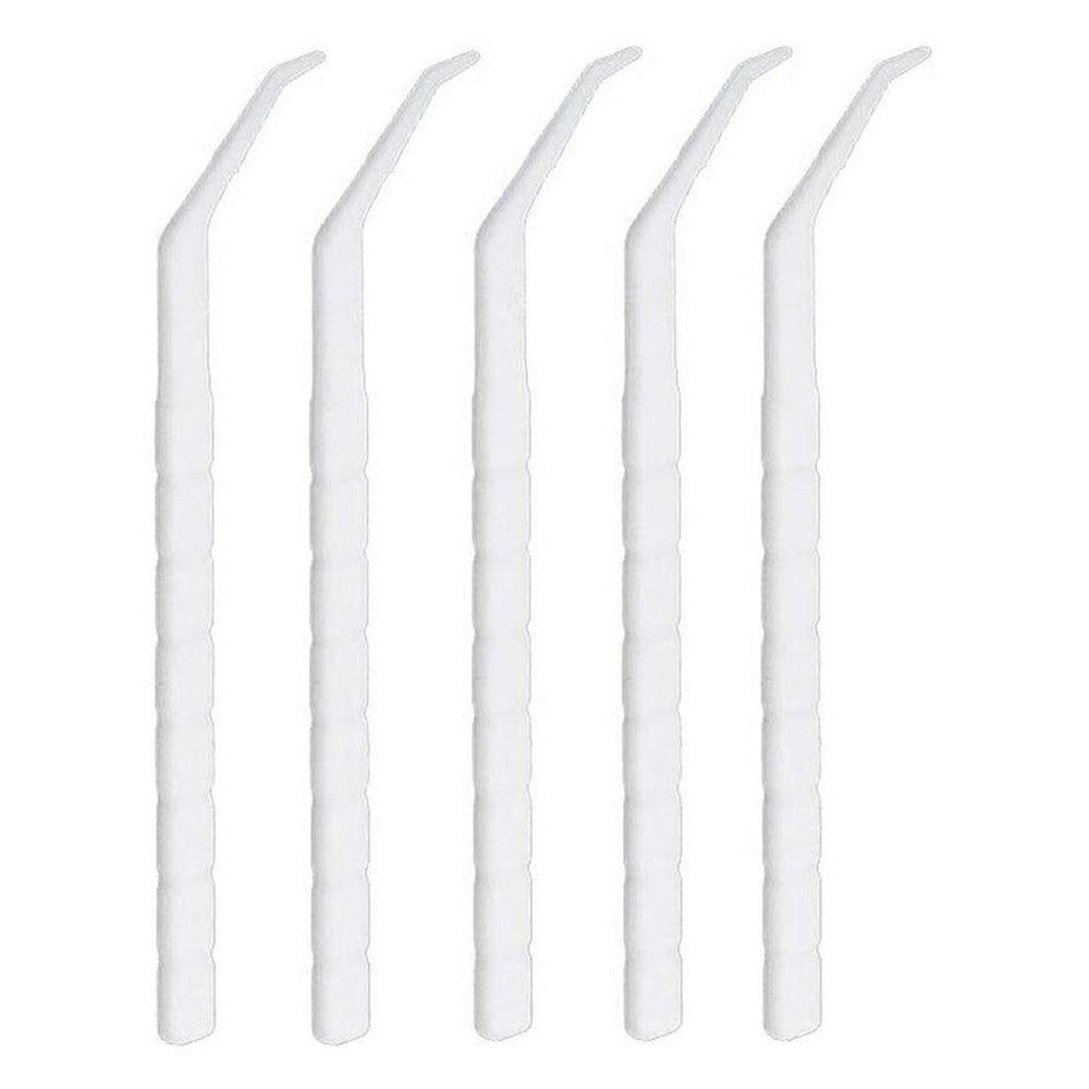 Tapered safety tip of GARASANI toothpick between teeth