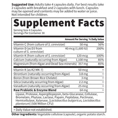 Calcium supplement capsules with bottle cap in focus