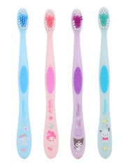 Front view of four cute character toothbrushes with compact heads for kids