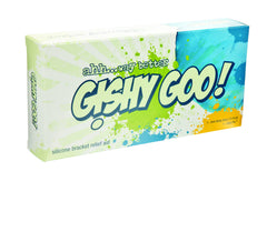 Bubblegum flavor Gishy Goo being applied over braces