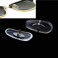 Glasses with clip-on nose pads attached for secure fit