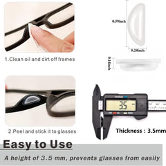 Eyewear with white adhesive nose pads applied