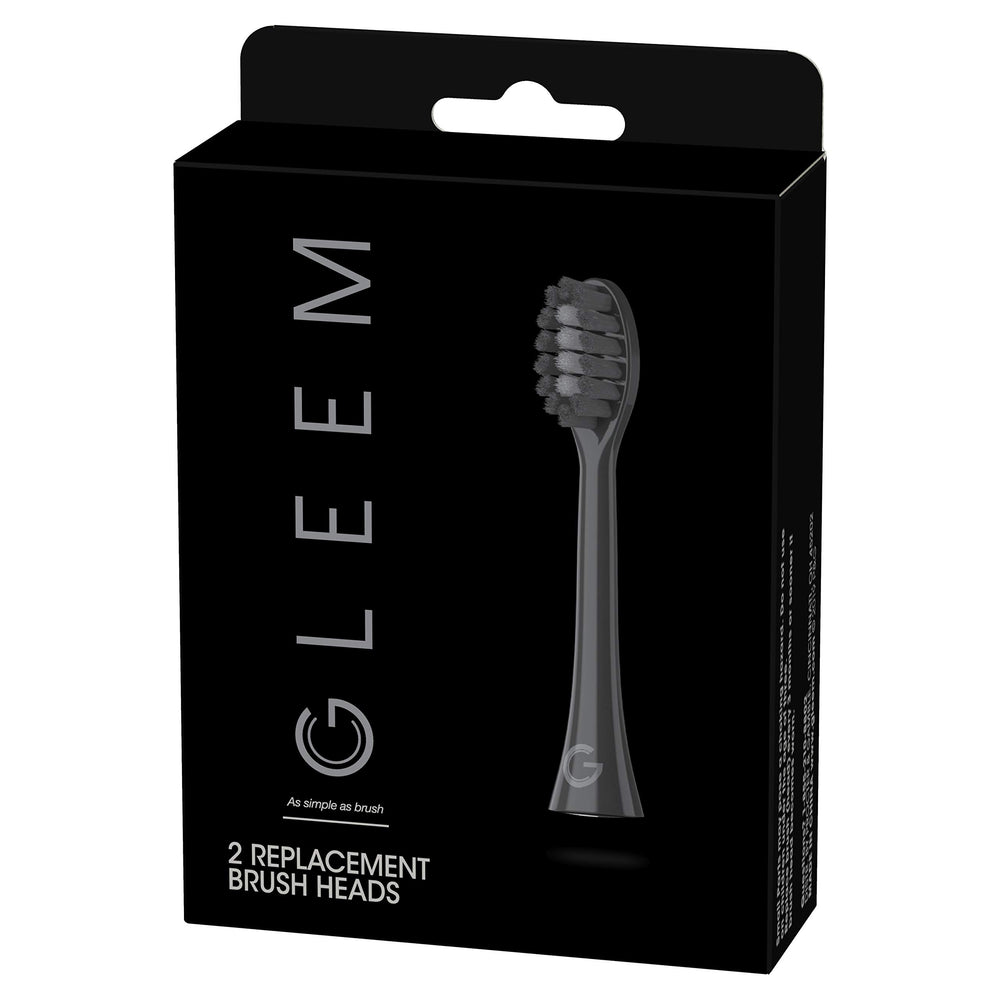 Two replacement brush heads displayed in black