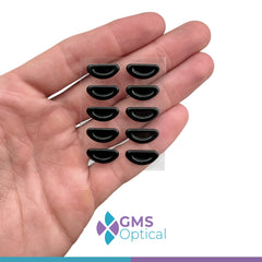 Nose pads attached to plastic frame eyeglasses