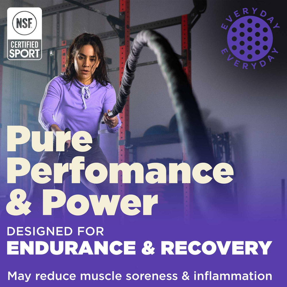 Scoop of unflavored creatine powder next to canister