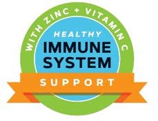 GNC Total Lean strawberry banana shake poured into glass for refreshing beverage.