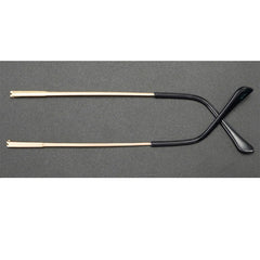Close-up of gold metal glasses replacement arm end with TR-90 tip