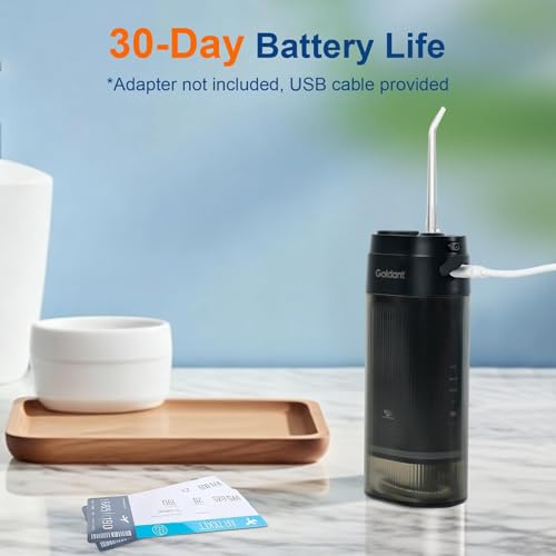 Complete kit contents: water flosser, four nozzles, travel case, manual and USB cable