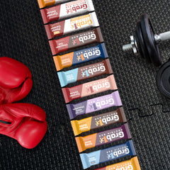 Grab1 bar break-open showing chewy chocolate texture and protein fueling snack.