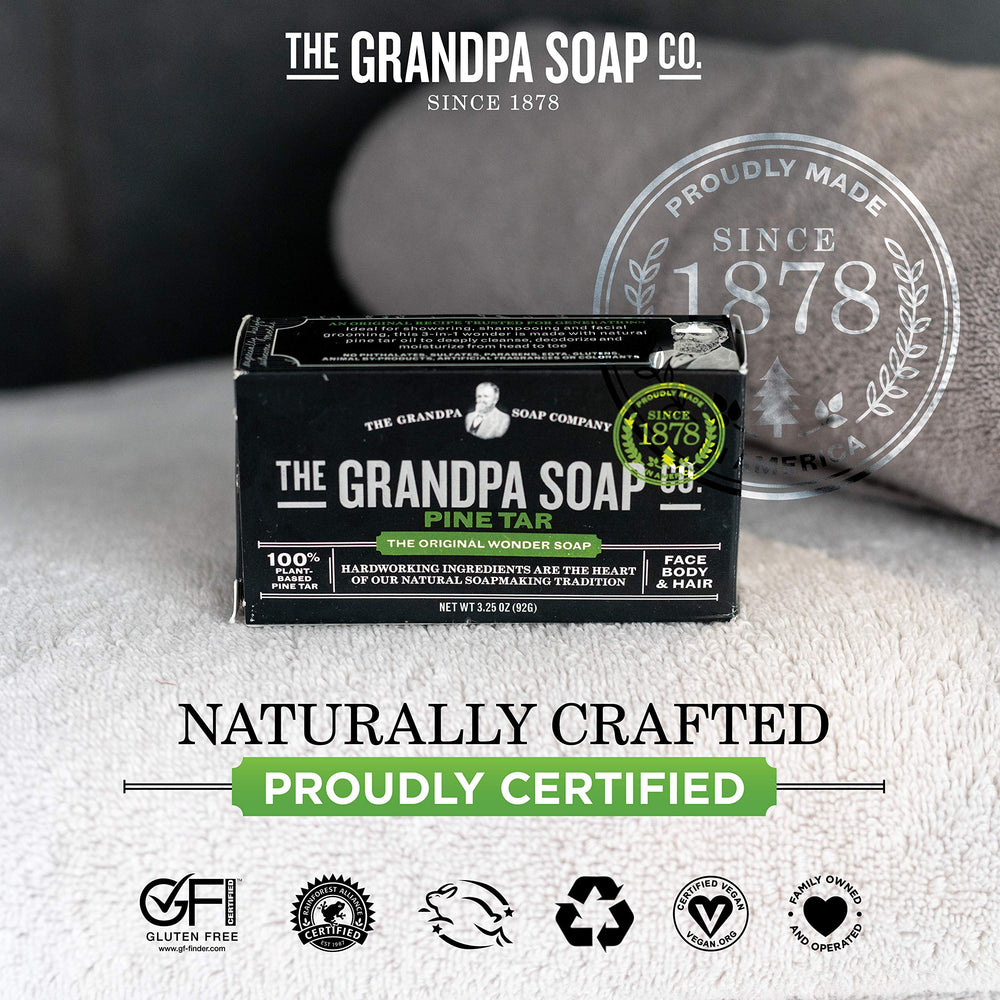 Pine tar soap bar with natural earthy background