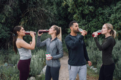 Beet powder being poured into a glass