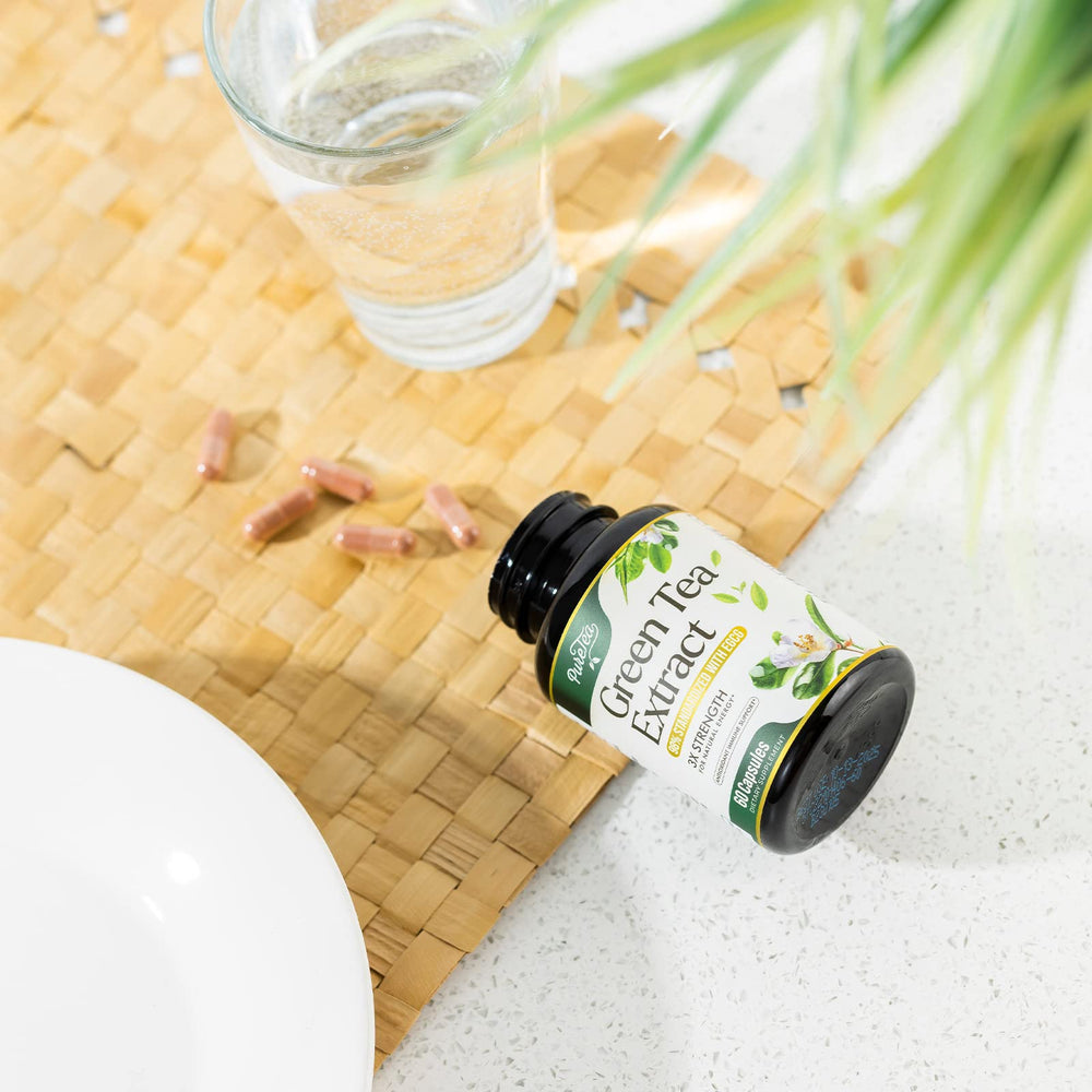 Concept image for heart support with green tea capsules