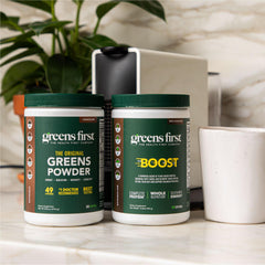 Greens First Boost ingredient close-up features non-GMO brown rice and pea protein.