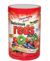 Serving glass with Greens World Delicious Reds 8000 Strawberry-Kiwi drink